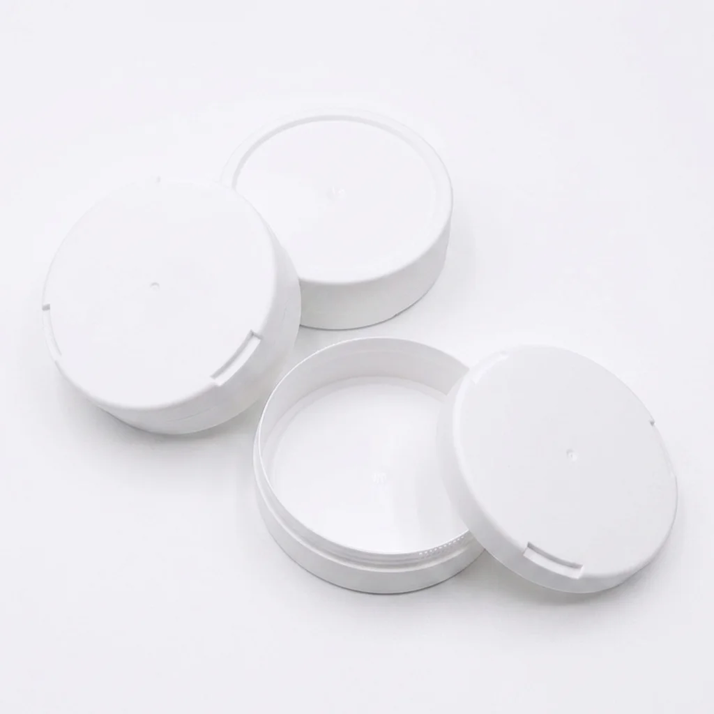 MANKE empty plastic snus cans arranged for wholesale volume orders